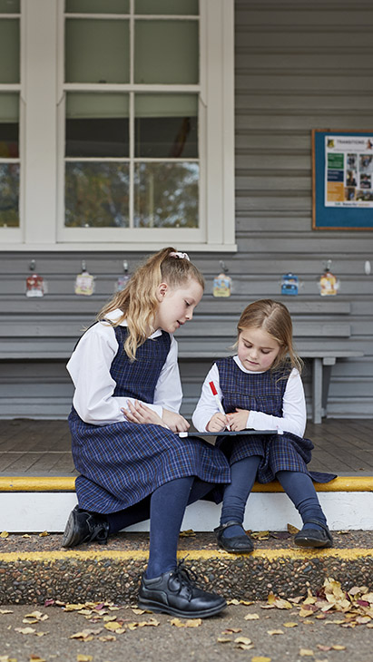 Students outside working.