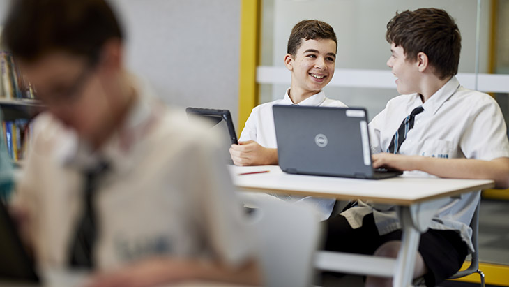 Two students working together in the science lab.