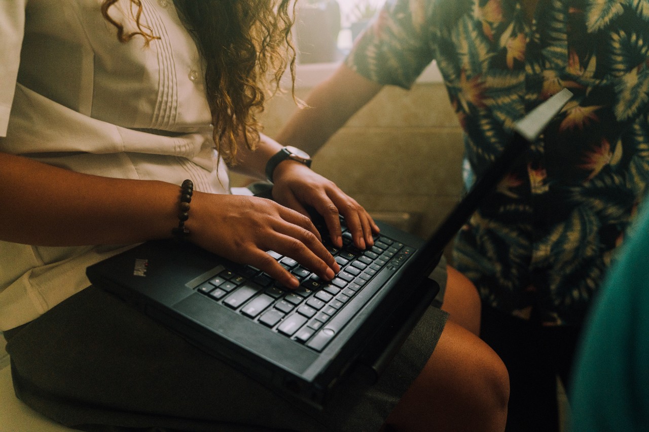 Student using the laptop.